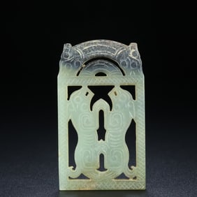 A Han Dynasty double tiger jade plaque