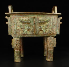 A Western Zhou bronze beast-faced square tripod