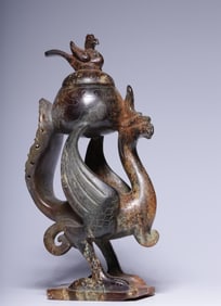 An ancient jade belt with a phoenix bird incense burner ornament