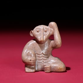 A Han Dynasty jade monkey handle
