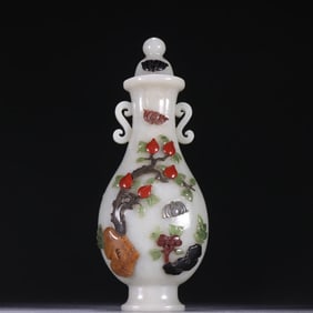 A Qing Dynasty Hetian jade inlaid treasure blessing longevity pattern bottle