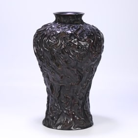A Qing Dynasty rosewood stump pattern plum vase ornament