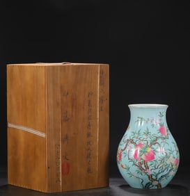A Qing Dynasty Yongzheng apple green pastel folded branch longevity peach pattern melon edge bottle