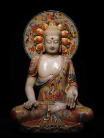 A painted Buddha statue of Tang and Han white jade