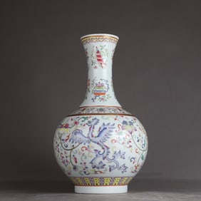 A Qing Dynasty Guangxu pastel eight treasure pattern phoenix wearing flower appreciation vase
