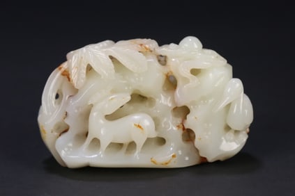 A Qing Dynasty Hetian jade deer crane and spring mountain ornament