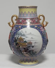 A Qing Dynasty Qianlong era enamel floral pattern consecrated landscape with gold-painted blessing