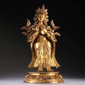 A Qing Dynasty bronze gilt lotus statue of Guanyin