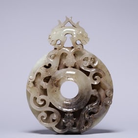 A piece of Hetian jade belt with hollow relief dragon pattern out of the outline