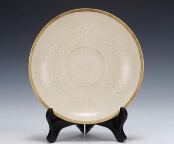 A Song Ding kiln carved flower plate