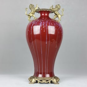 A kiln-glazed copper lion amphora vase