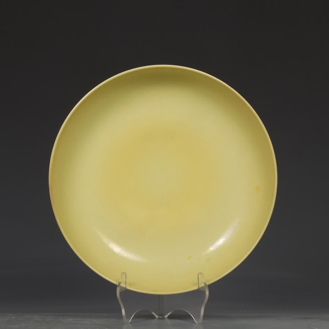 A Ming Dynasty Chenghua delicate yellow glaze plate (1 of 8)