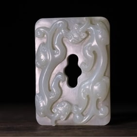 A Qing Dynasty double dragon scroll cloud pattern jade wall hanging pendant