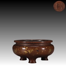 A Ming Dynasty finely cast copper tire with gold sprinkled gold pot hand furnace