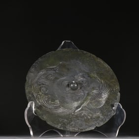 A Tang phoenix pattern bronze mirror