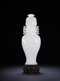 A Qing Dynasty Hetian jade Kui dragon pattern bottle