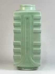 A Qing Dynasty Qianlong year bean celadon eight hexagrams worn with a sect style bottle