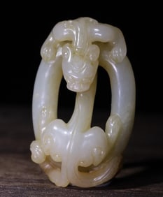 A Qing Dynasty jade carving dragon wearing a ring