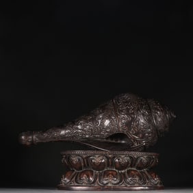 A snail ornament of the late Qing Dynasty agarwood dark eight immortal beasts