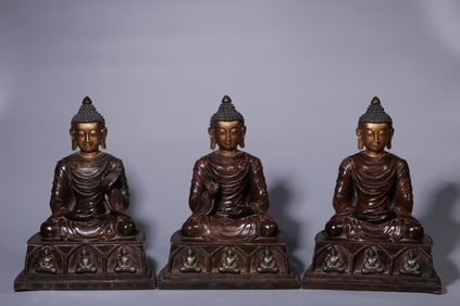 A set of seated Buddha of the Qing Dynasty with copper and silver clay and gold face