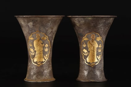 A pair of Tang Dynasty sterling silver figure cups