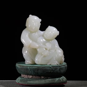A Qing Dynasty jade carving double happiness boy ornament
