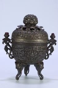 A Qing Dynasty cupronickel carved dragon pattern amphorae fragrant foot lotus button stove