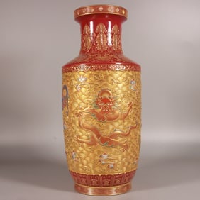 A Qing Dynasty Qianlong enamel colored gold carved dragon pattern mallet bottle