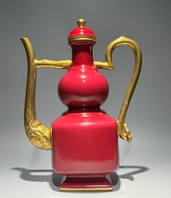A Qing Dynasty Qianlong ruby red gilt Tianxuan local wine jug