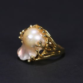 A baroque pearl-clad silver-gilt ring