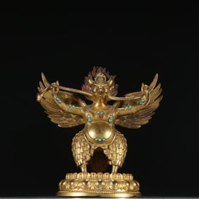 A statue of a bronze gilt roc bird in the Ming Dynasty