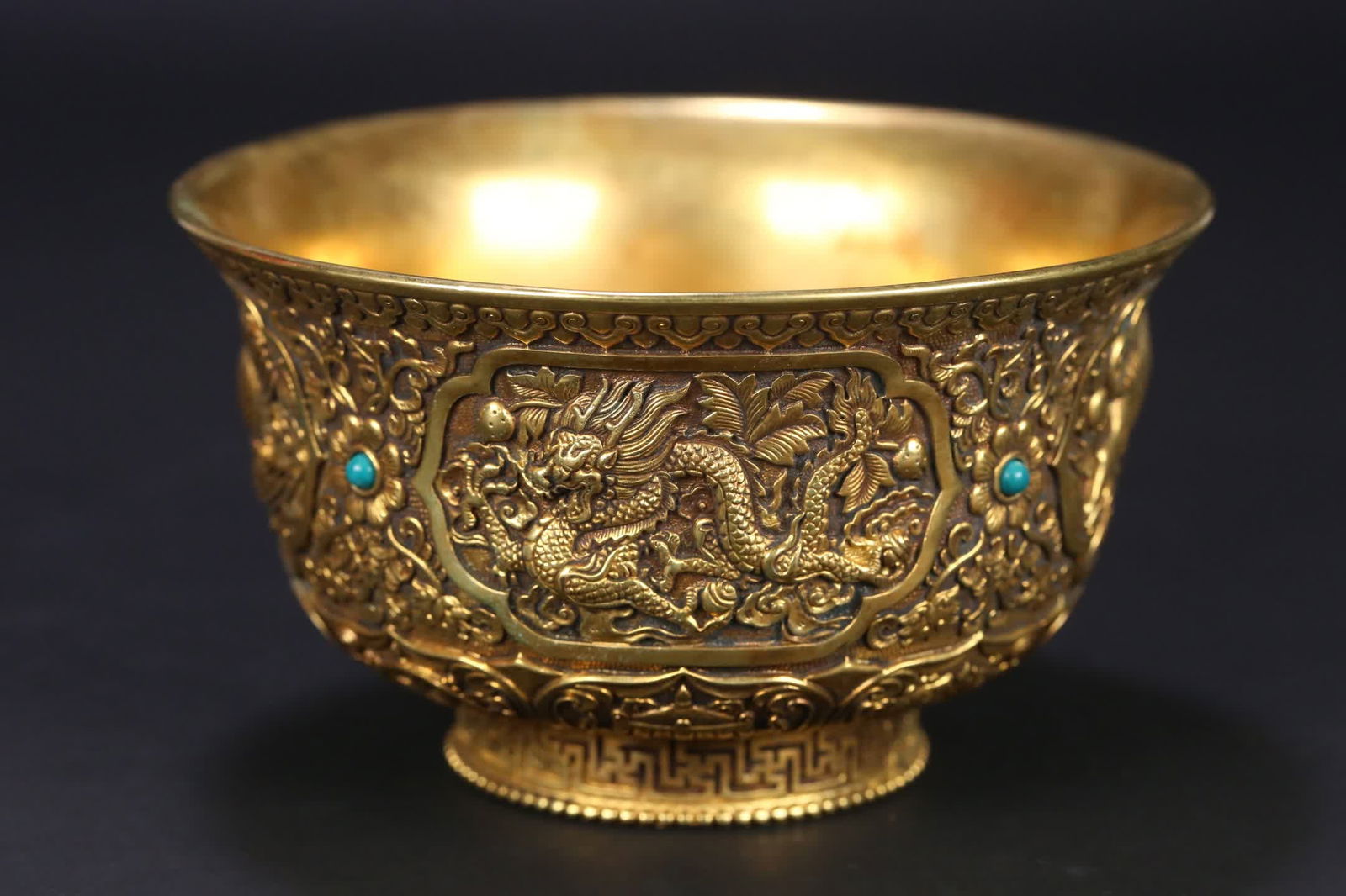 A copper gilt dragon, phoenix, tiger and beast eight treasure pattern bowls (1 of 9)
