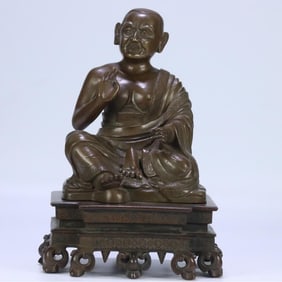 An early alloy copper seated guru