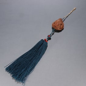 A nuclear carving character story pendant