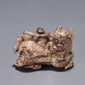 A Han Dynasty Hetian jade unicorn carving