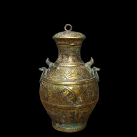 An inscription on a bronze gold double-ring jar in the Han Dynasty
