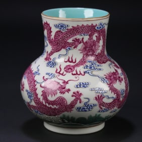 A Qing Dynasty Qianlong pastel carmine dragon pattern vase