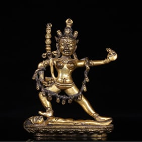 A Qing Dynasty bronze gilt Dakinu statue