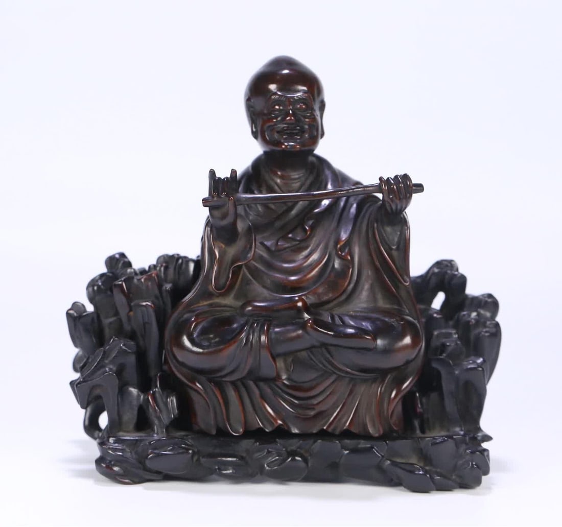 A Qing Dynasty rosewood arhat ornament (1 of 9)