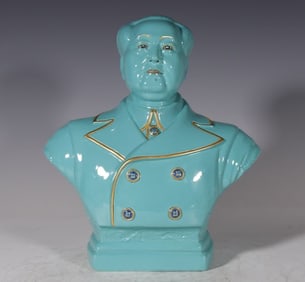 A piece of turquoise green Chairman Mao