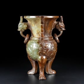 A piece of ancient jade three-legged cup