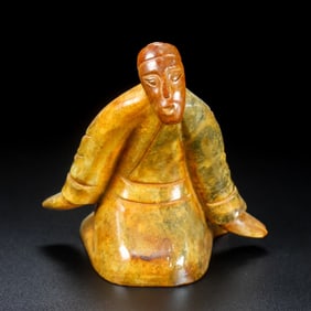 A carving of a high ancient jade figure