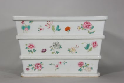 A Qing Dynasty Qianlong pastel flower square pot