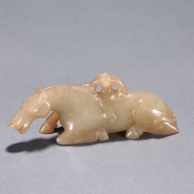 A Hetian jade Hu person training horse ornament