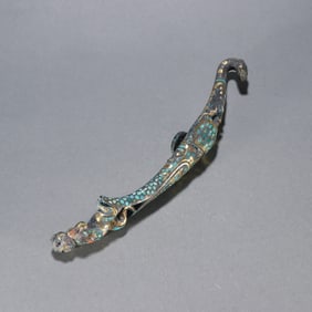 A piece of Han Dynasty copper cuo gold and silver inlaid turquoise belt hook
