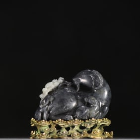 A Qing Dynasty blue and white seed material three sheep Kaitai ornament