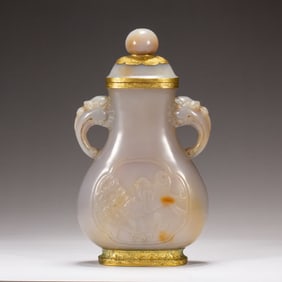 A Qing Dynasty agate-wrapped gold vase