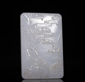 A Qing Dynasty Hetian white jade hunting map is listed