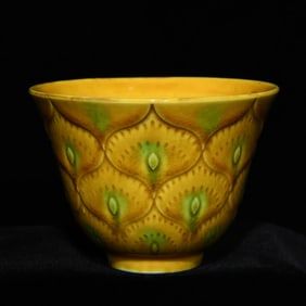 A Ming Hongzhi delicate yellow glaze pointillism cup