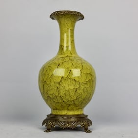 A yellow glaze kiln glazed copper-edged appreciation bottle